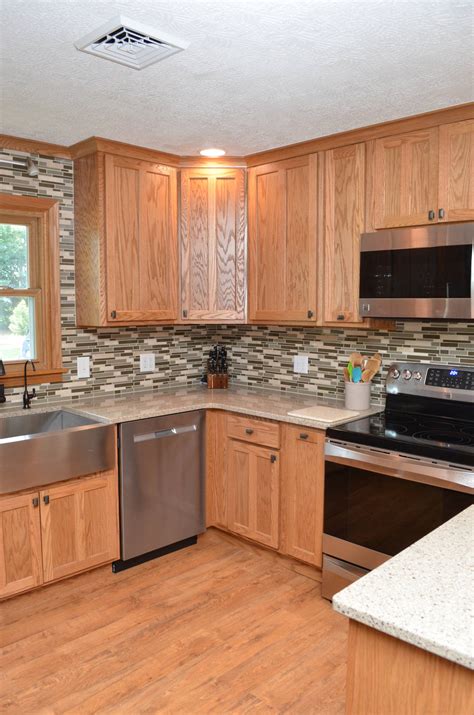 stainless steel cabinets with honey oak cabinets|countertops with honey oak cabinets.